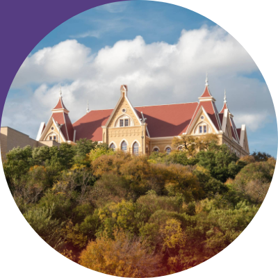 Image of Texas State University campus in San Marcos, Texas, featuring historic Old Main building in circular photo