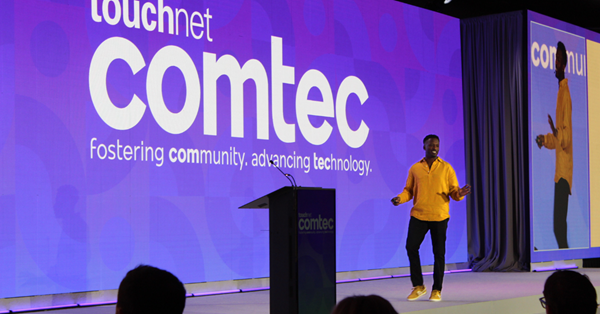 Charles Clark on the main stage at COMTEC 2025